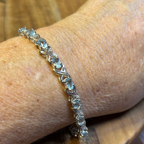 Jewelry - Sterling silver bracelet with blue topaz stones